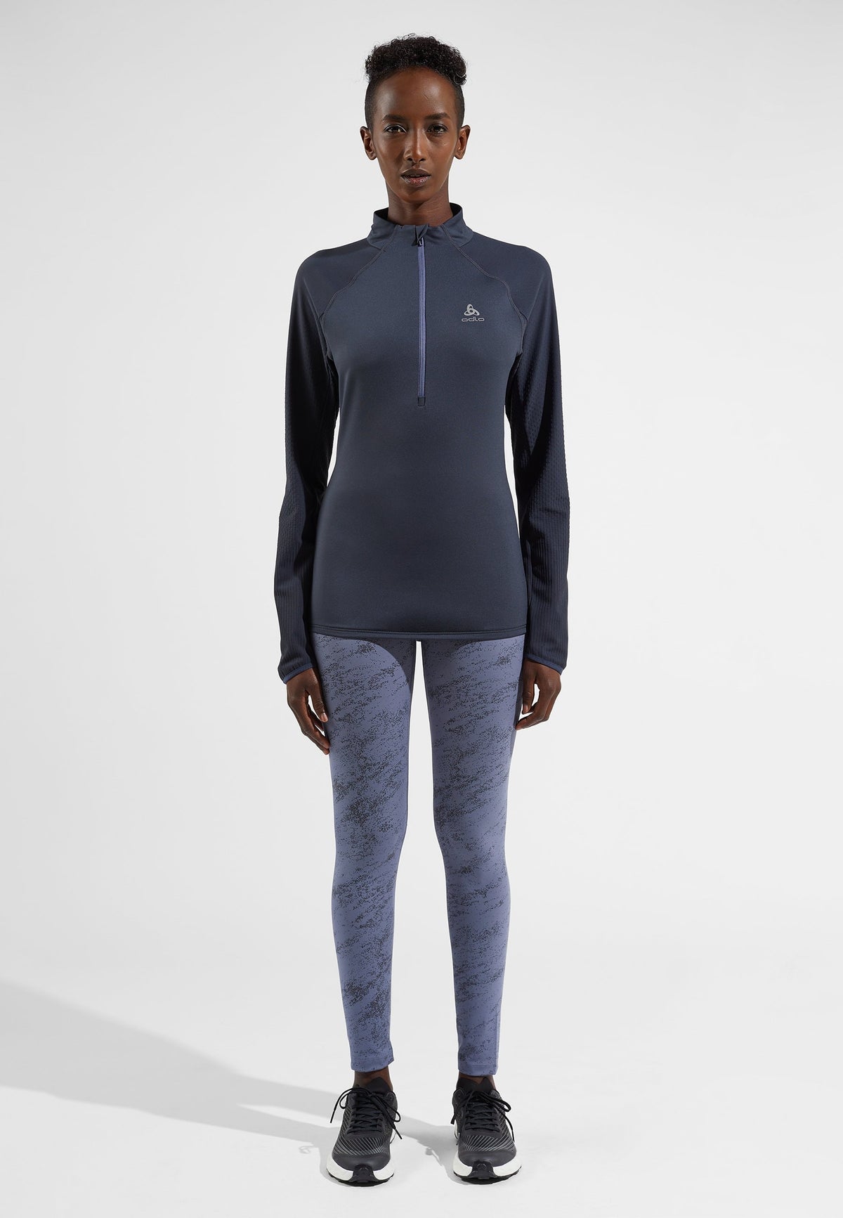The Zeroweight mid layer running half-zip