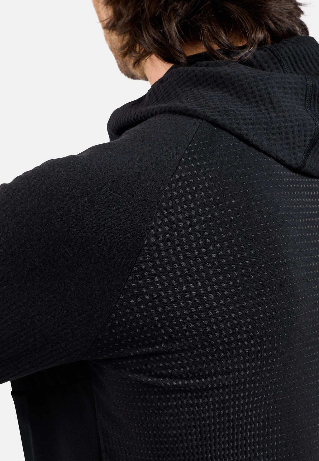 The Zeroweight Pro Performance Wool windproof seamless hooded mid layer