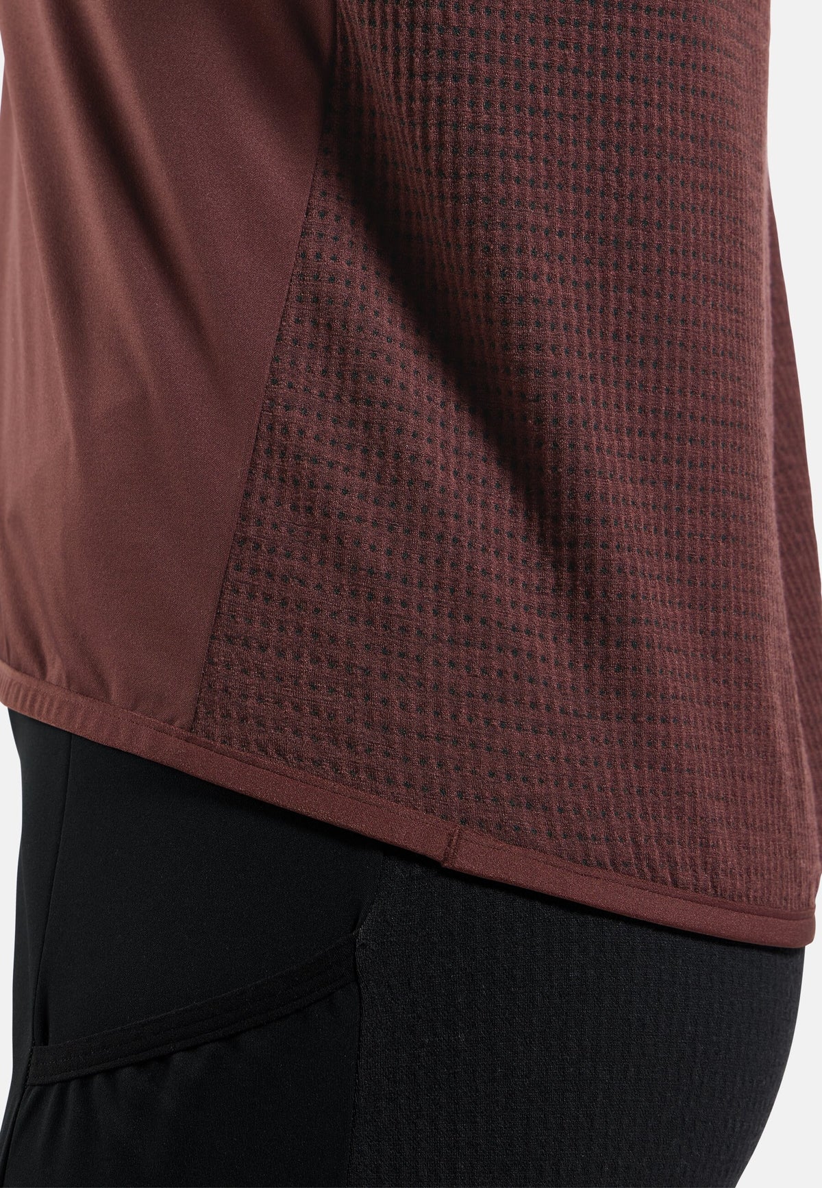The Zeroweight Pro Performance Wool windproof seamless hooded mid layer